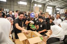 H.R.H Crown Prince Al Hussein Bin Abdullah packing during a volunteer initiative to send aid through The Hashemite Charitable Organization Humanitarian Aid to Gaza