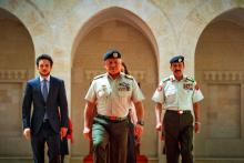 His Majesty the Supreme commander of Jordanian Armed Forces, Accompanied by Her Majesty Queen Rania Al Abdullah and HRH Crown Prince Al Hussein, hands the Hashemites flag to the Chairman of the Joint Chiefs of Staff, Gen. Mashal Mohammad Zaben 9/6/2015