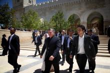 H.R.H. Crown Prince Al Hussein Bin Abdullah II with His Majesty King Abdullah II ibn Al Hussein exiting(or departing from) The King Hussein Bin Talal Mosque after Friday prayers 2013