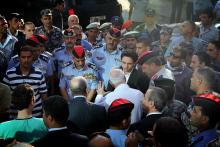 H.R.H. Crown Prince Al Hussein bin Abdullah II checks on  Farah Hospital staff after a fire at the hospital’s Expansion Project, 2013