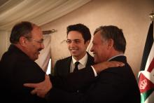 H.R.H. Crown Prince Al Hussein bin Abdullah II with His Majesty King Abdullah II ibn Al Hussein greet a guest during a Ramadan Iftar, July 2013