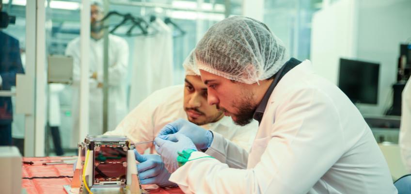 Crown Prince helps assemble final piece of Jordan’s first nanosatellite, records audio message to be transmitted from space