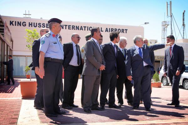 flights to king hussein international airport